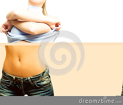 Young woman undressing, color version Stock Photo