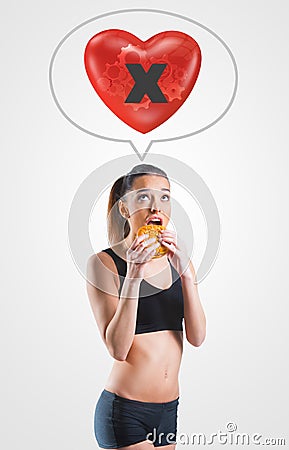 Young woman on unhealthy diet for an unhealthy heart Stock Photo