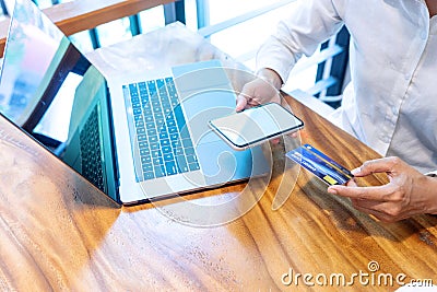 Young woman use credit card Stock Photo