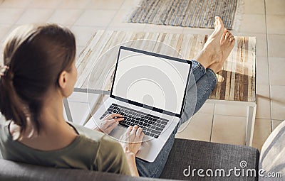 Young woman using laptop computer at home. Freelance, student lifestyle, education, technology and online shopping concept Stock Photo