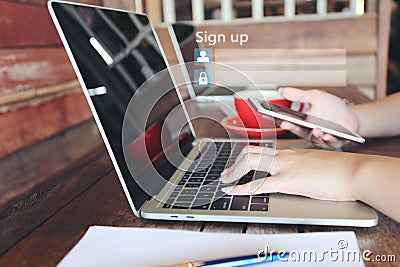 Young woman using laptop computer and sign up or log in username password in coffee shop,GDPR.cyber security and privacy concept Stock Photo