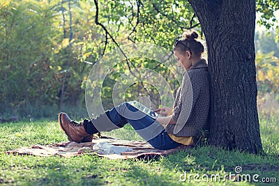 Young woman using tablet pc Stock Photo