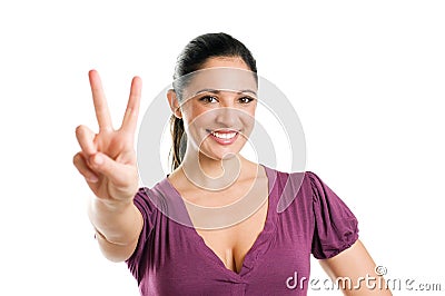 Young woman with victory sign Stock Photo