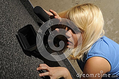 Young woman video camera Stock Photo