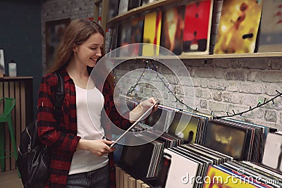 Young woman with vinyl record Stock Photo