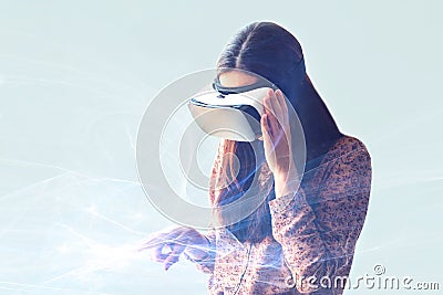 Young woman with virtual reality glasses. Modern technologies. The concept of future technology. Editorial Stock Photo