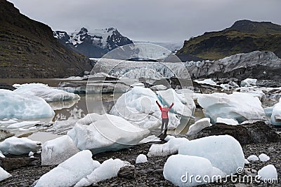 Young woman visiting nature landscape in Iceland glacier Stock Photo