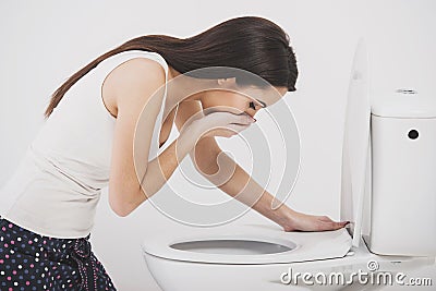 Woman in toilet Stock Photo