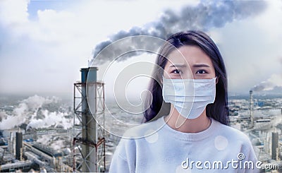 Young woman wear mask with air pollution background Stock Photo