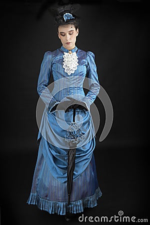A young woman wearing an 1880s Victorian costume Stock Photo