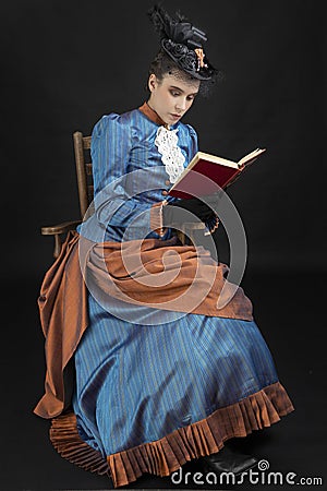 A young woman wearing an 1880s Victorian costume Stock Photo