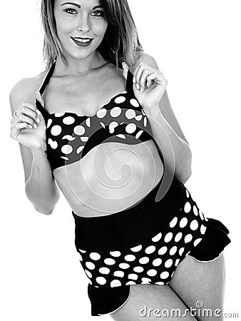 Young Woman Wearing a Vintage Polka Dot Bikini Stock Photo