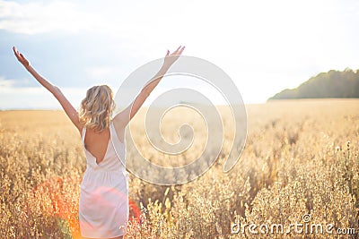 young woman in wheat field . Portrait of young girl Stock Photo