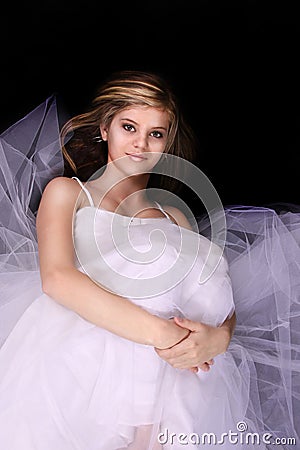 Young Woman in a White Gown Stock Photo