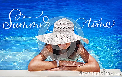 Young woman in white hat resting in pool and text Summer time. Calligraphy lettering hand draw Stock Photo