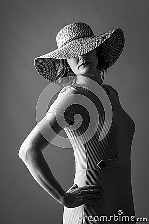 Young woman wiht a hat nice dress and red lips Stock Photo