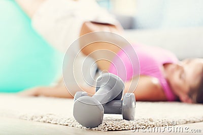 Young woman working out at home in the morning Stock Photo