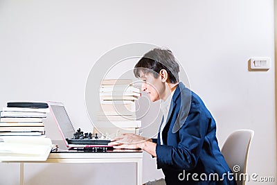 Young woman is working remotely at home Stock Photo