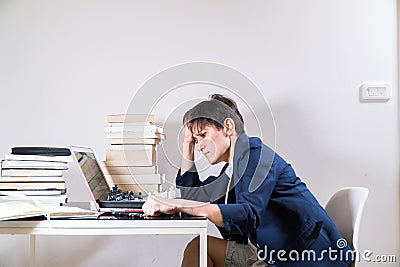 Young woman is working remotely at home Stock Photo