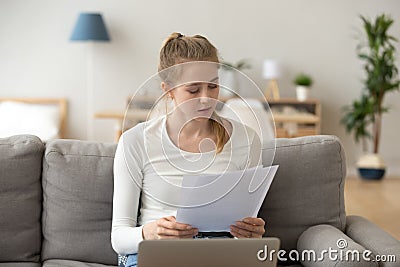 Young woman working studying alone at home Stock Photo