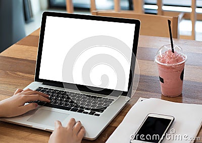 young woman working using a desktop computer of the blank scree Stock Photo