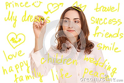 Young woman writing her dreams Stock Photo