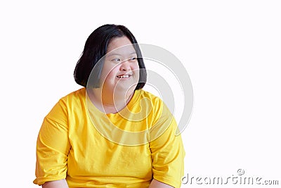 Young women with aphasia or Down syndrome She is a cerebral palsy student wearing a yellow dress on a white background - Down Stock Photo