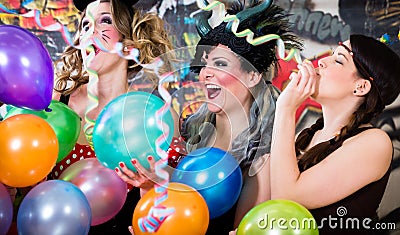 Young women celebrating German fasching Carnival at Rose Monday Stock Photo