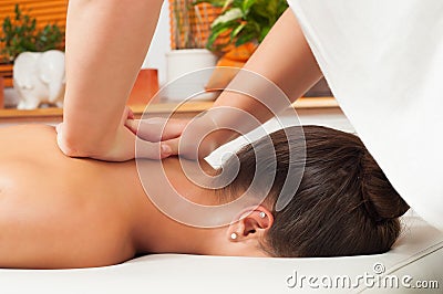 Young women getting back massage Stock Photo