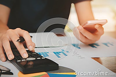 Young women of hand are calculating individual income tax to send information to government agencies. Stock Photo