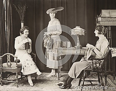 Young women knitting at home Stock Photo