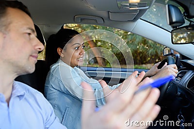 Young woman learning to drive Stock Photo