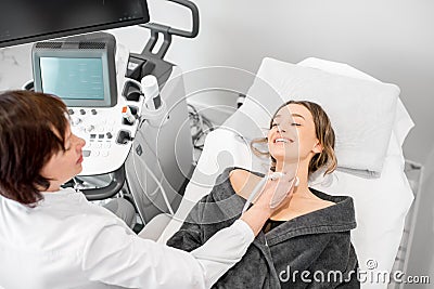 Woman during the ultrasound examination Stock Photo