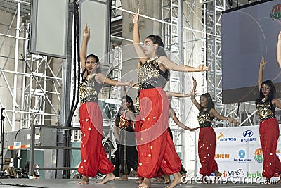 Young women perform a Bollywood Dance Editorial Stock Photo