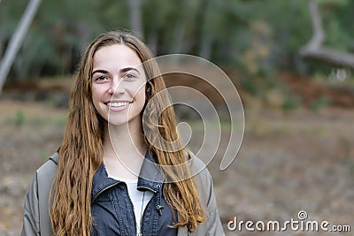 Young women poses outdoors smiling Stock Photo