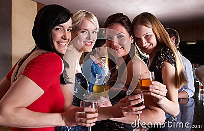 Young women posing at party Stock Photo