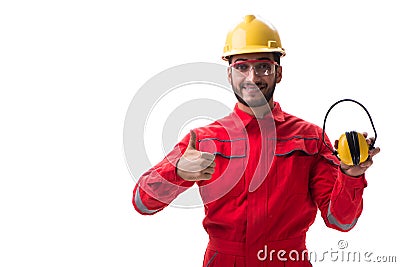 The young worker with noise cancelling headphones on white Stock Photo