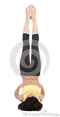Young yoga female doing yogatic exericise Stock Photo