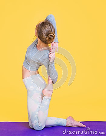 Young yogini woman stretching Stock Photo