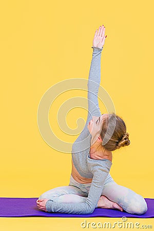 Young yogini woman stretching Stock Photo
