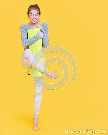 Young yogini woman before yoga glass Stock Photo