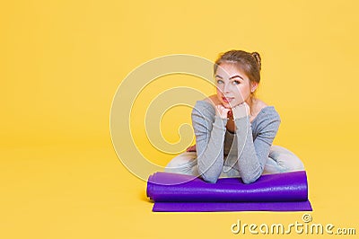 Young yogini woman before yoga glass Stock Photo