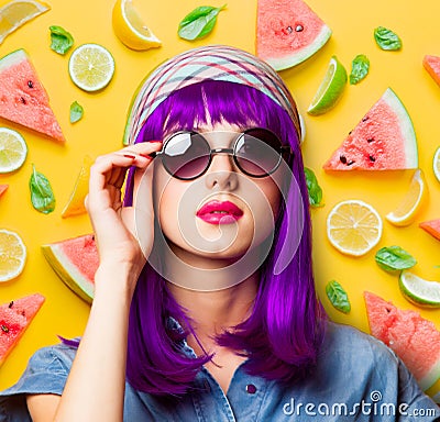 Young girl with purple hair and sunglasses Stock Photo