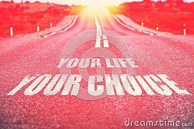 .Your Life Your Choice written on road. Selective focus. Toned. Stock Photo