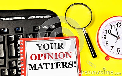 Your opinion matters. Text message in Notepad on the computer keyboard. Stock Photo