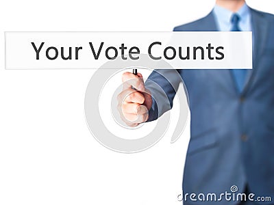 Your Vote Counts - Business man showing sign Stock Photo