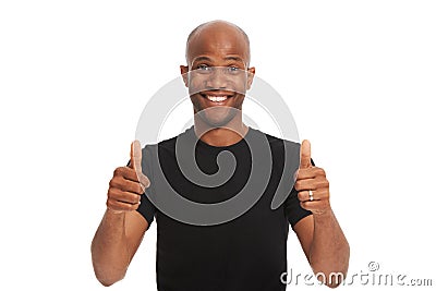 Youre doing great. Studio portrait of a handsome african american man giving the thumbs up isolated on white. Stock Photo