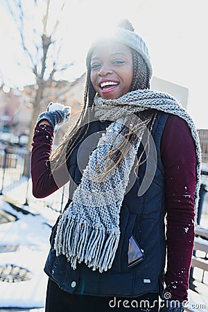 Youre looking at the snowball fighting champ here. a beautiful young woman throwing a snowball on a wintery day outdoors Stock Photo