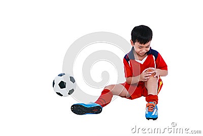 Youth asian soccer player with pain in knee joint. Full body. Stock Photo