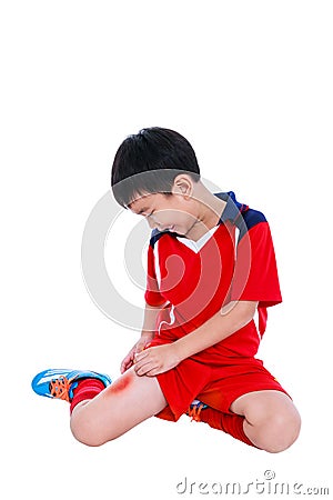 Youth asian soccer player with pain in thigh. Stock Photo